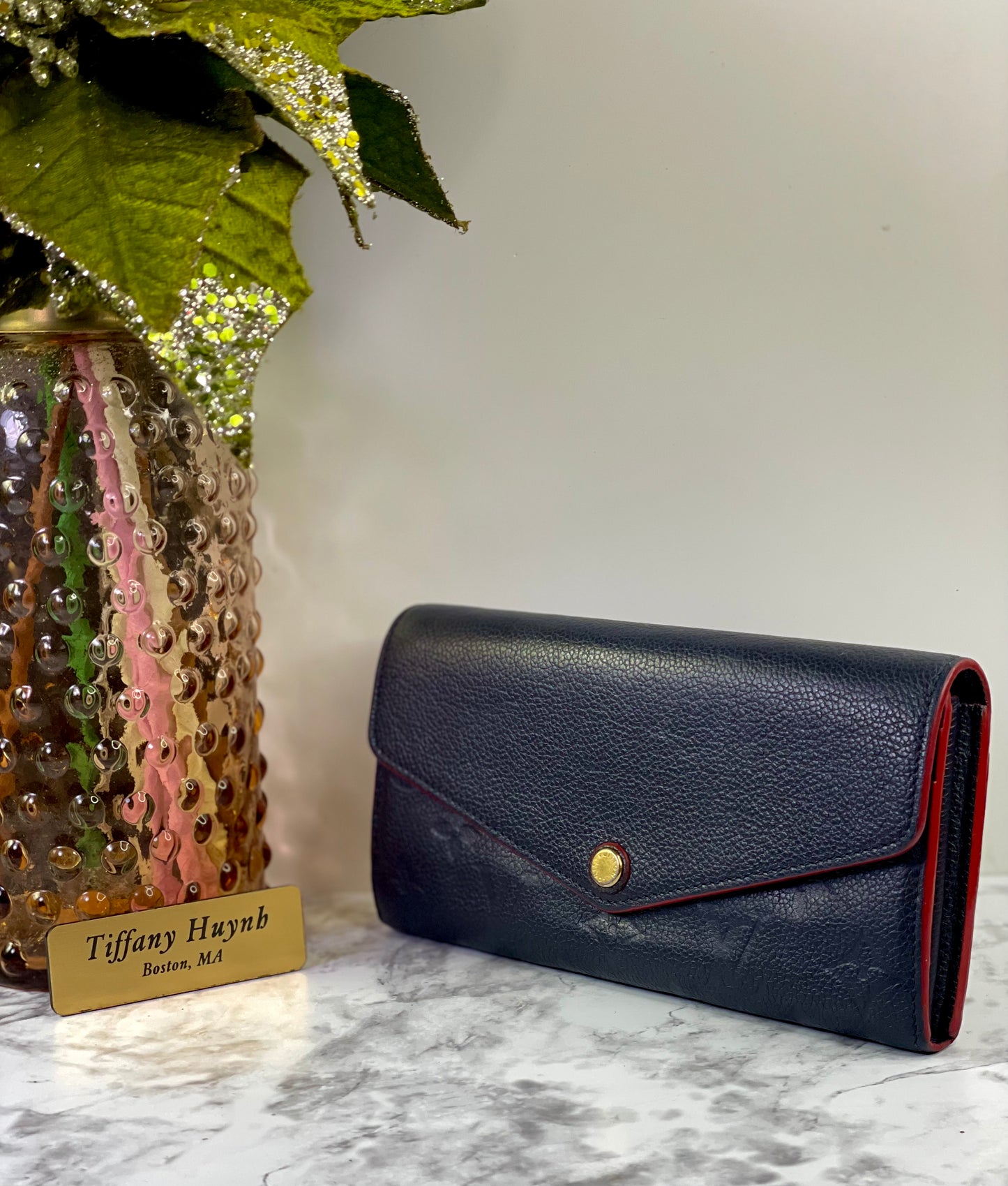Authentic Louis Vuitton Empreinte Sarah Wallet in Marine Rouge
