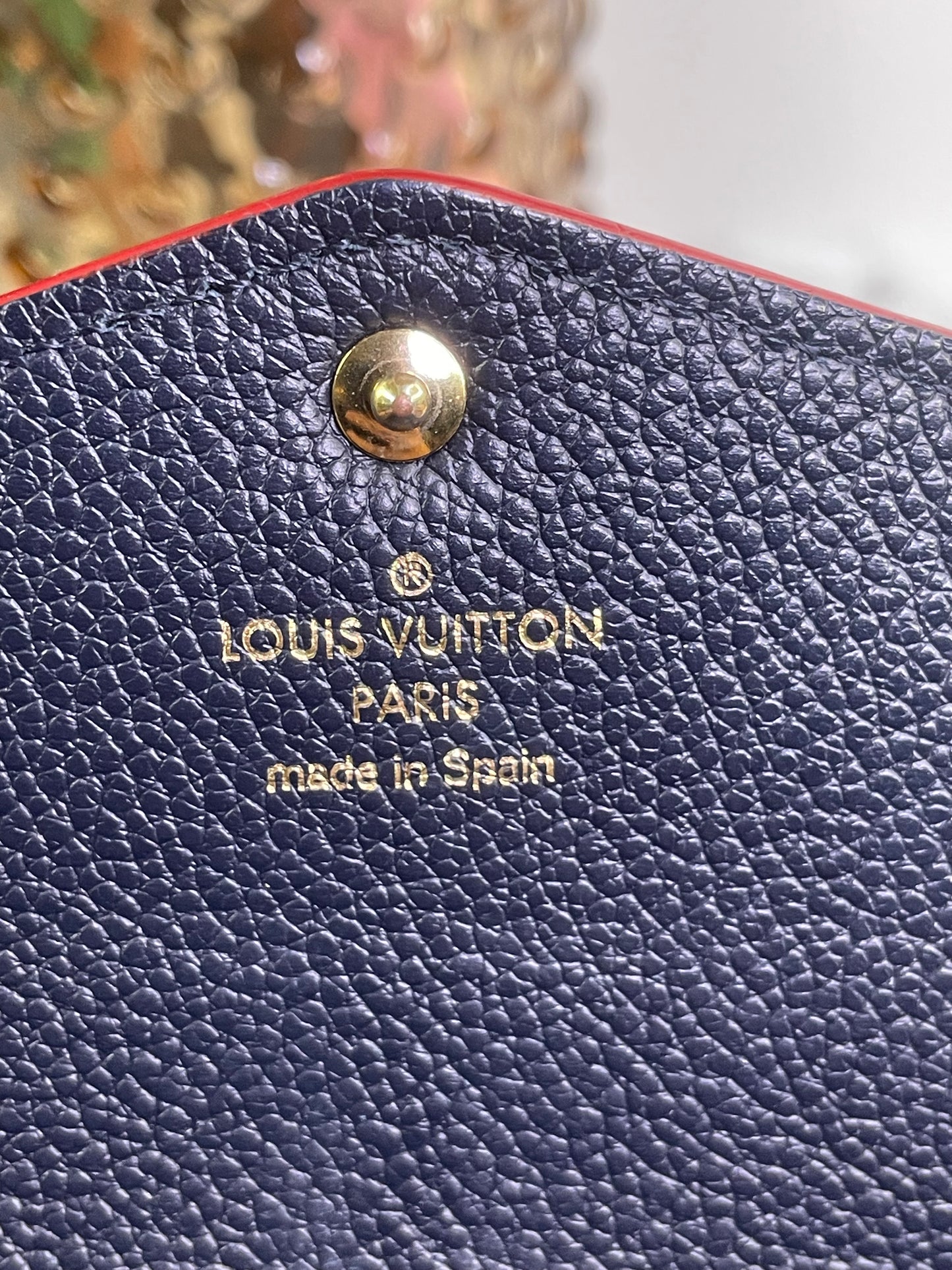 Authentic Louis Vuitton Empreinte Sarah Wallet in Marine Rouge