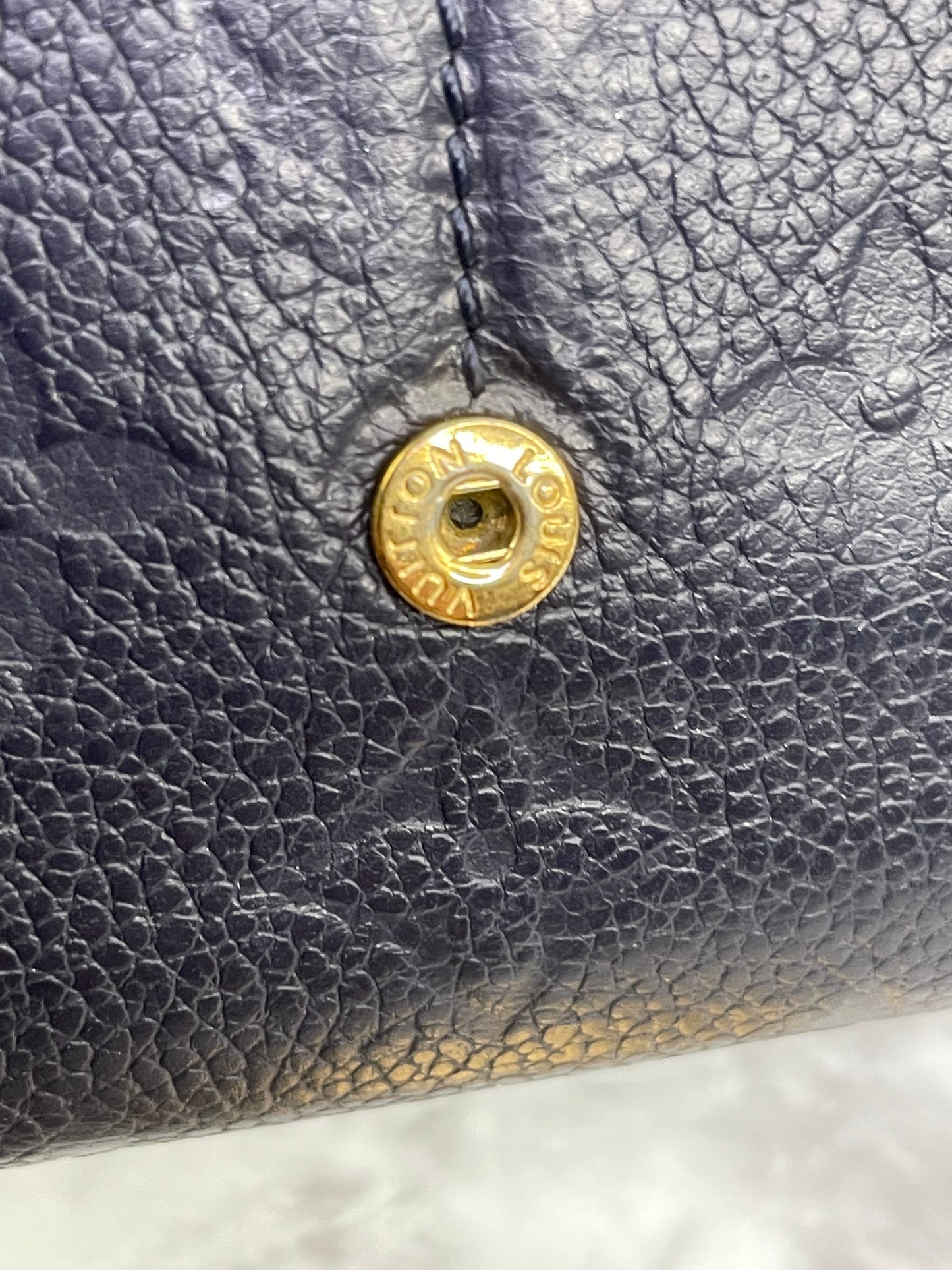Authentic Louis Vuitton Empreinte Sarah Wallet in Marine Rouge