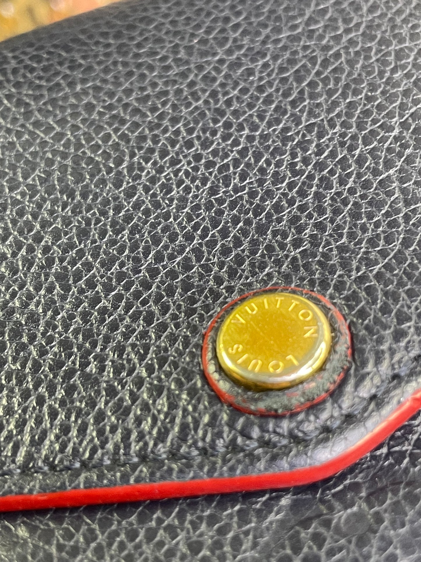 Authentic Louis Vuitton Empreinte Sarah Wallet in Marine Rouge