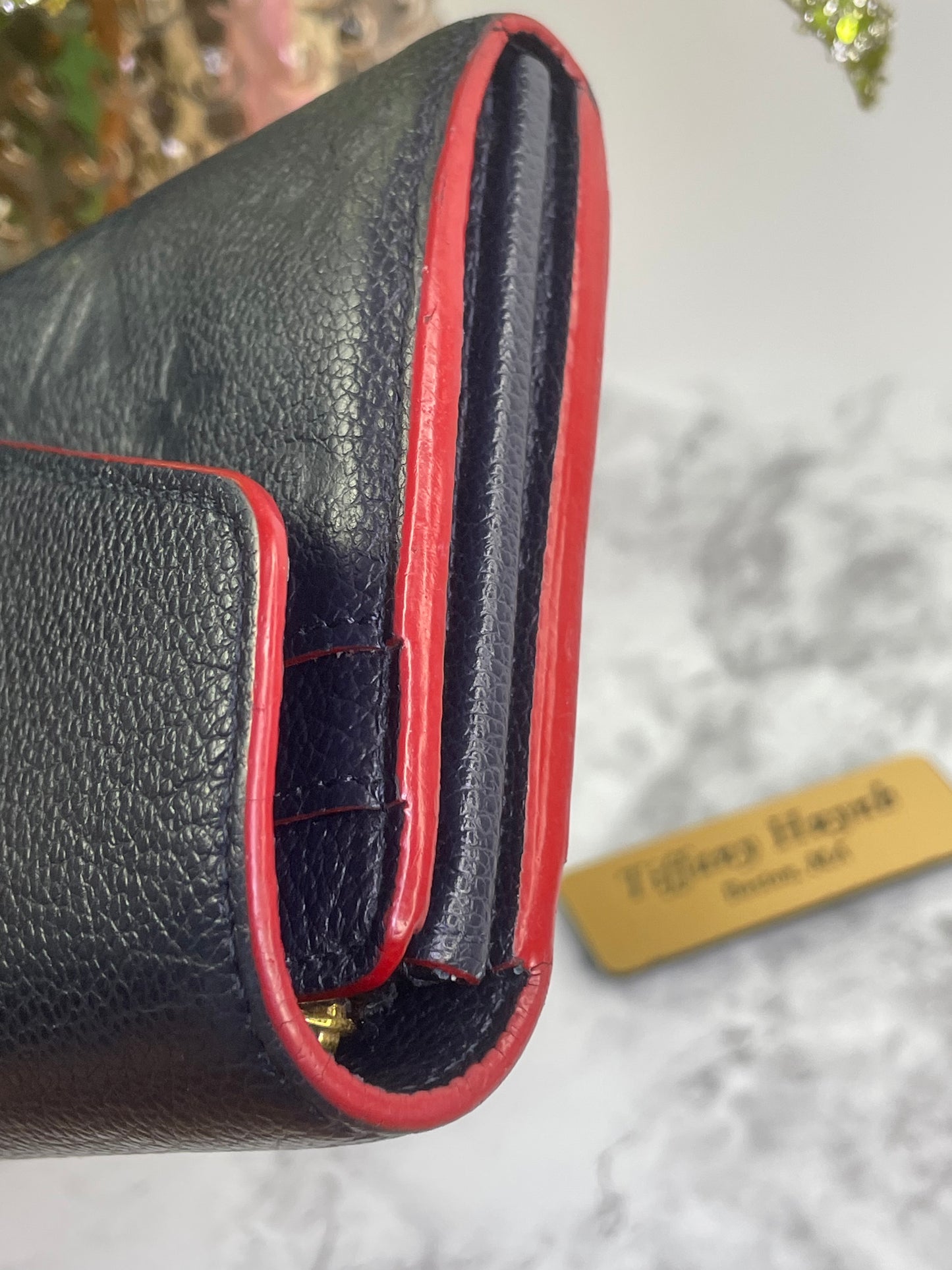 Authentic Louis Vuitton Empreinte Sarah Wallet in Marine Rouge