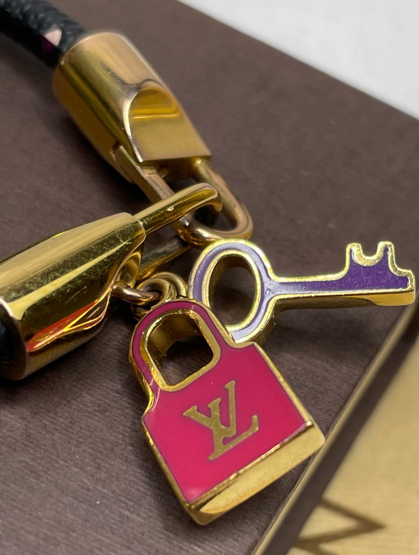 Authentic Takashi Murakami x Louis Vuitton Black Monogram Multicolore Luck It Bracelet