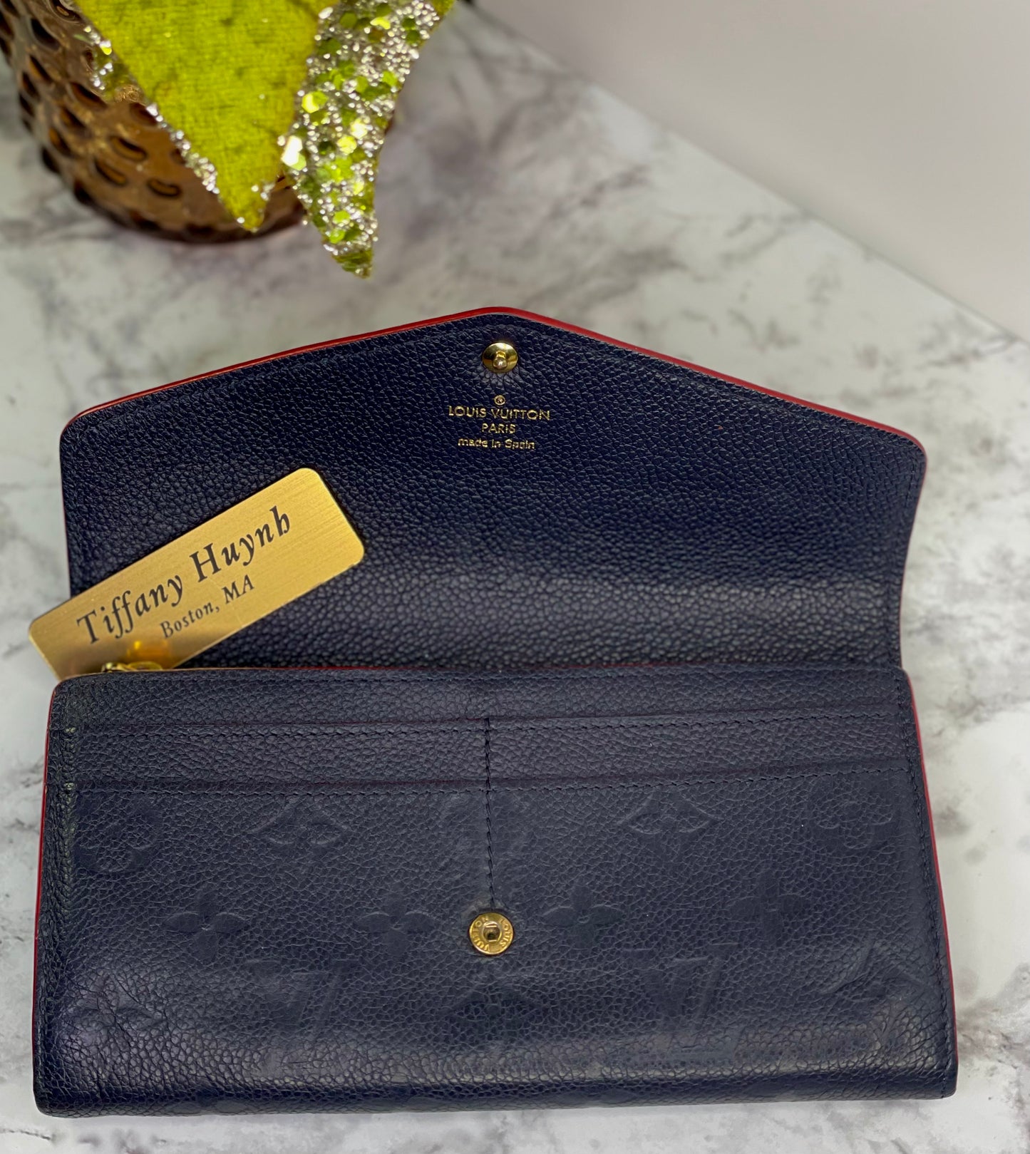 Authentic Louis Vuitton Empreinte Sarah Wallet in Marine Rouge