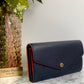 Authentic Louis Vuitton Empreinte Sarah Wallet in Marine Rouge