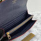 Authentic Louis Vuitton Empreinte Sarah Wallet in Marine Rouge