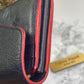 Authentic Louis Vuitton Empreinte Sarah Wallet in Marine Rouge