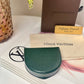 Authentic Louis Vuitton Taiga Porte-Monnaie Cuvette Coin Case in Epicea Green