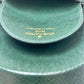 Authentic Louis Vuitton Taiga Porte-Monnaie Cuvette Coin Case in Epicea Green