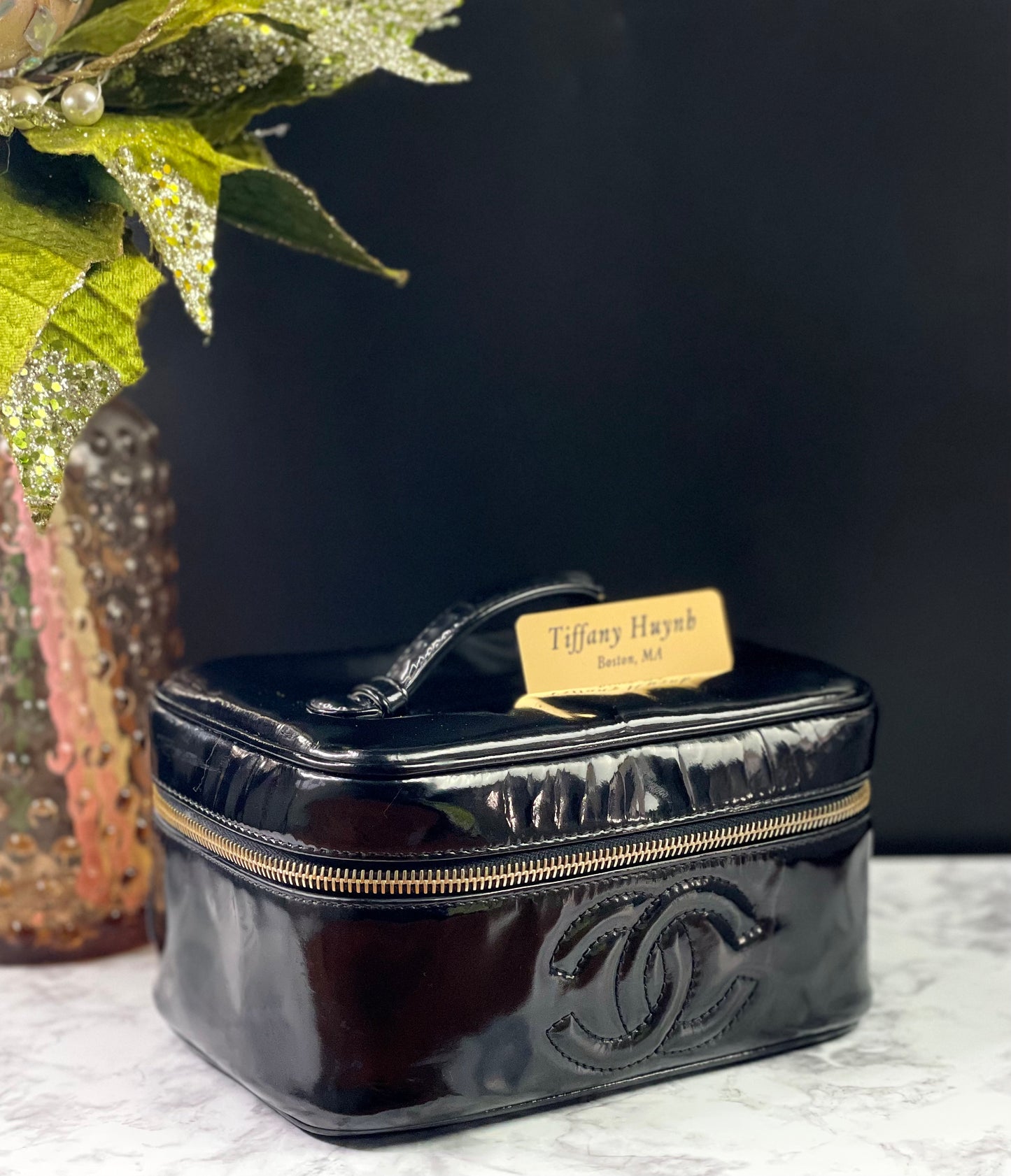 Authentic CHANEL Vanity Cosmetic Case crafted of Black Patent Leather