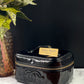 Authentic CHANEL Vanity Cosmetic Case crafted of Black Patent Leather