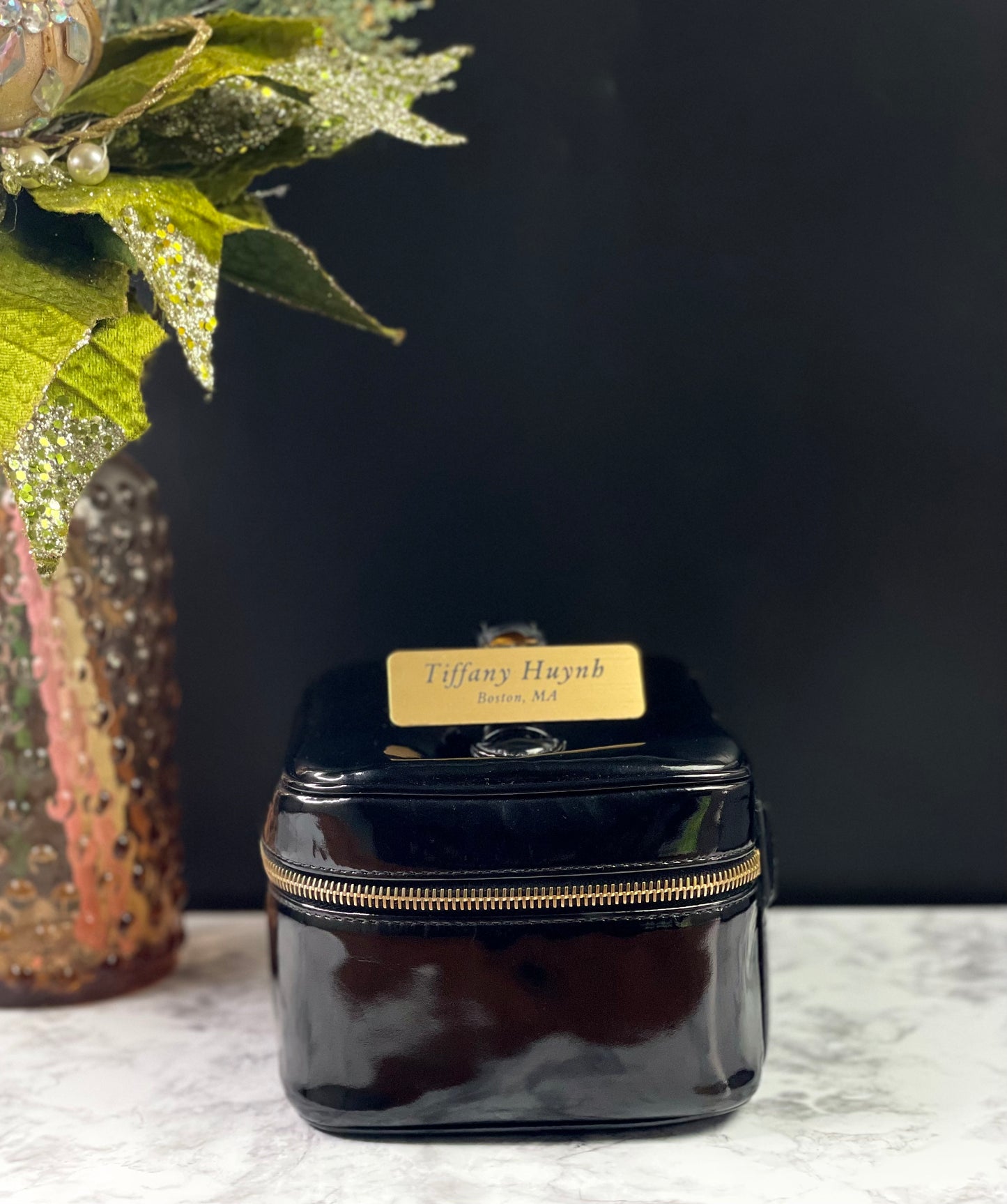 Authentic CHANEL Vanity Cosmetic Case crafted of Black Patent Leather