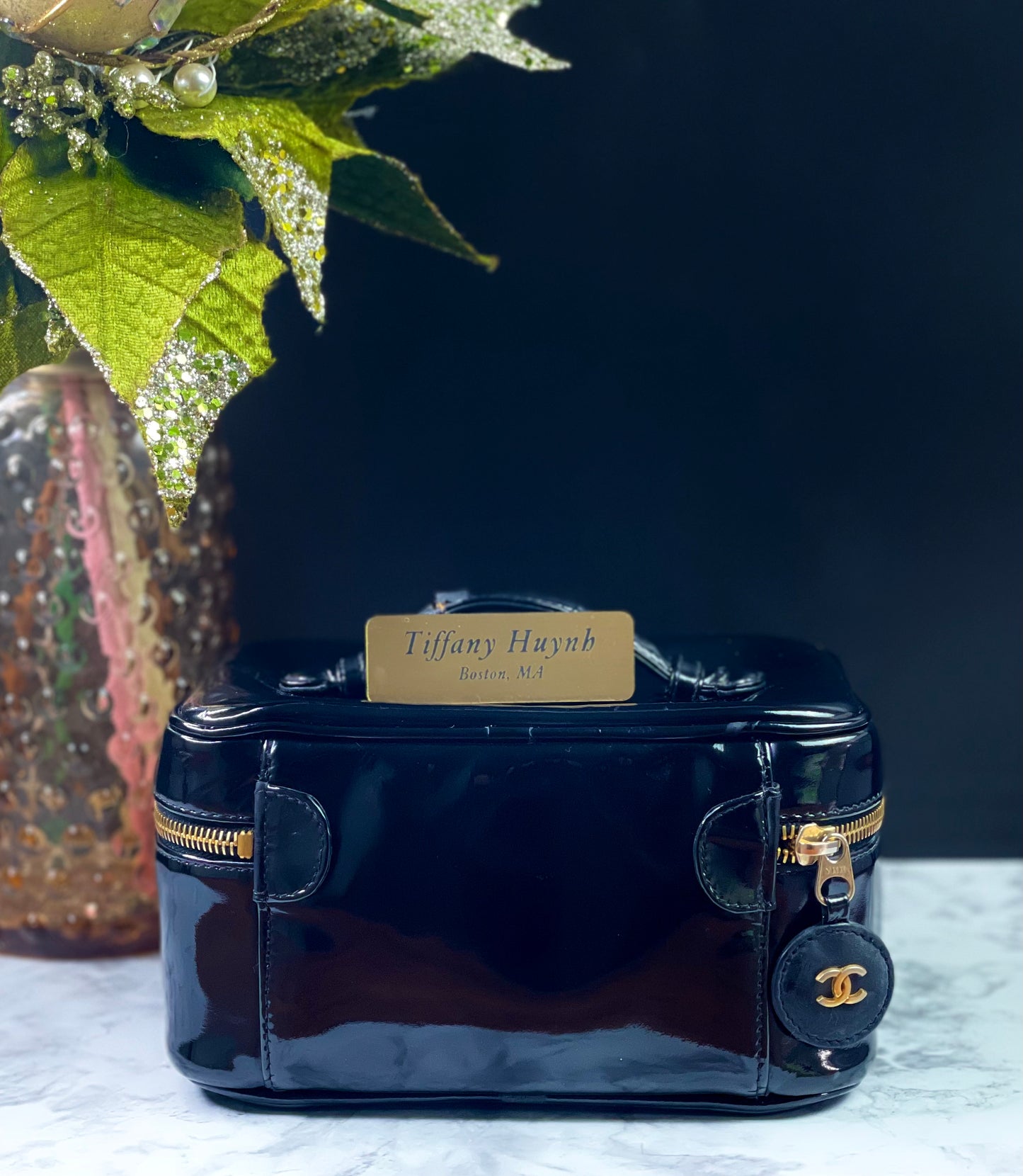 Authentic CHANEL Vanity Cosmetic Case crafted of Black Patent Leather