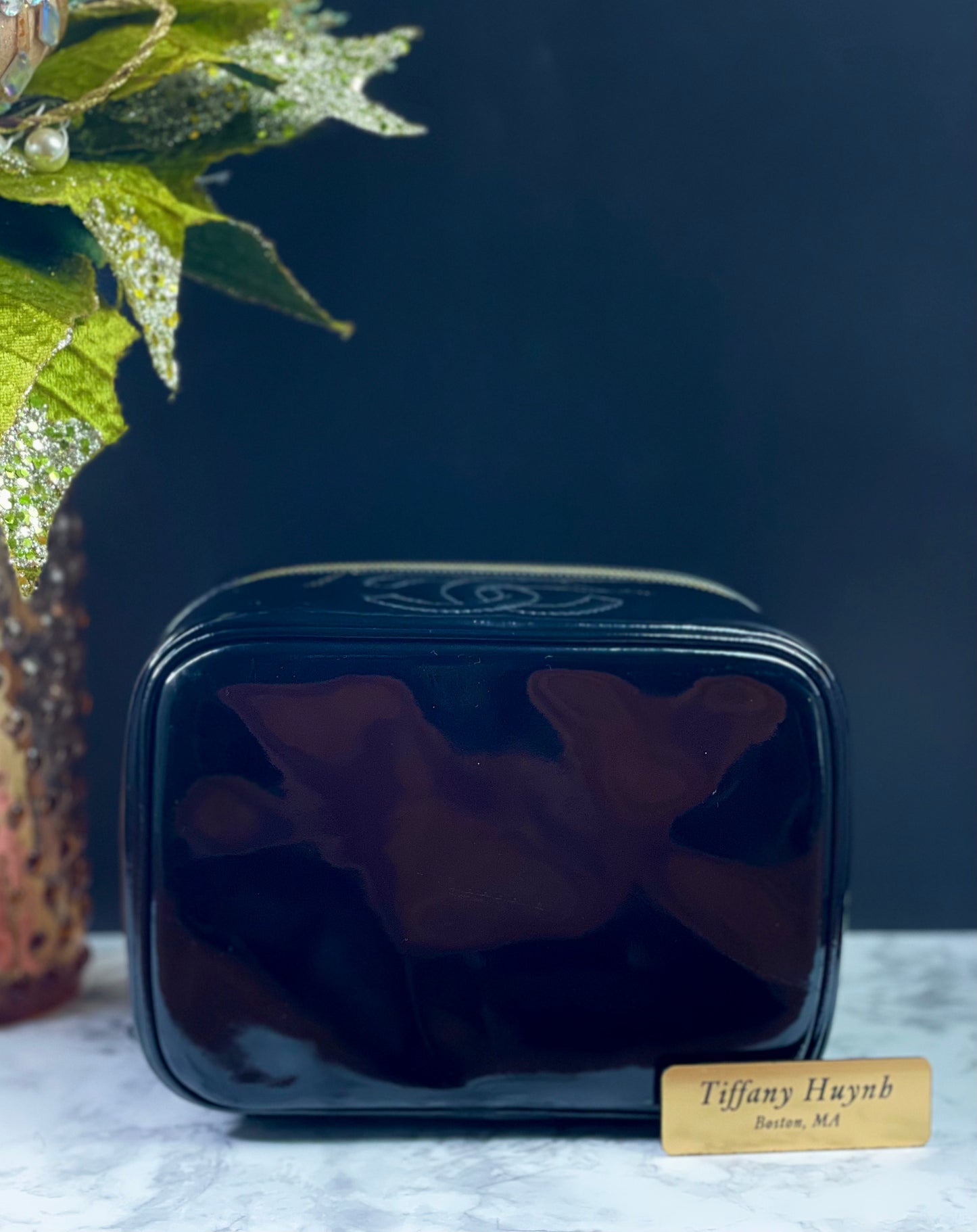 Authentic CHANEL Vanity Cosmetic Case crafted of Black Patent Leather