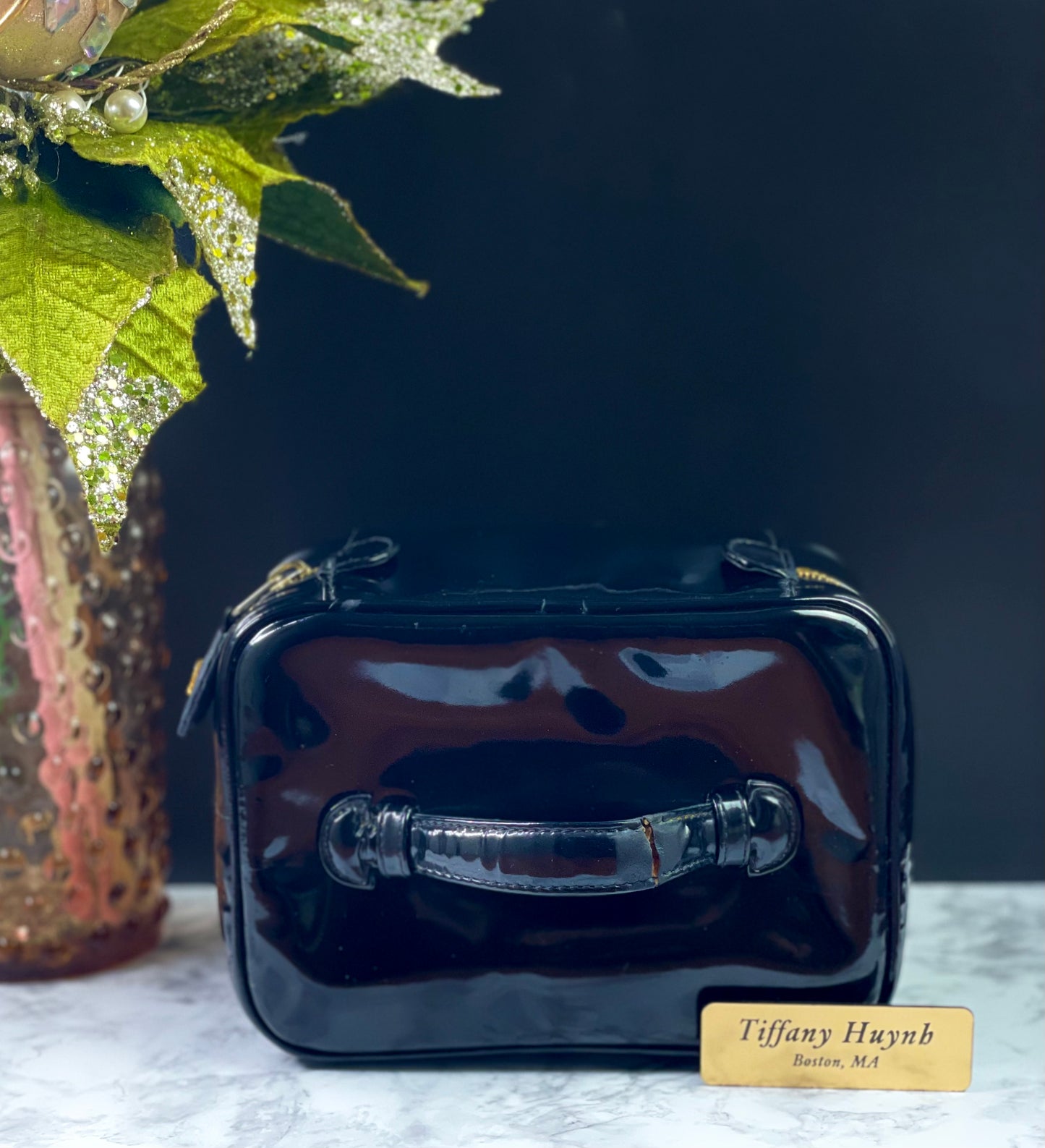 Authentic CHANEL Vanity Cosmetic Case crafted of Black Patent Leather