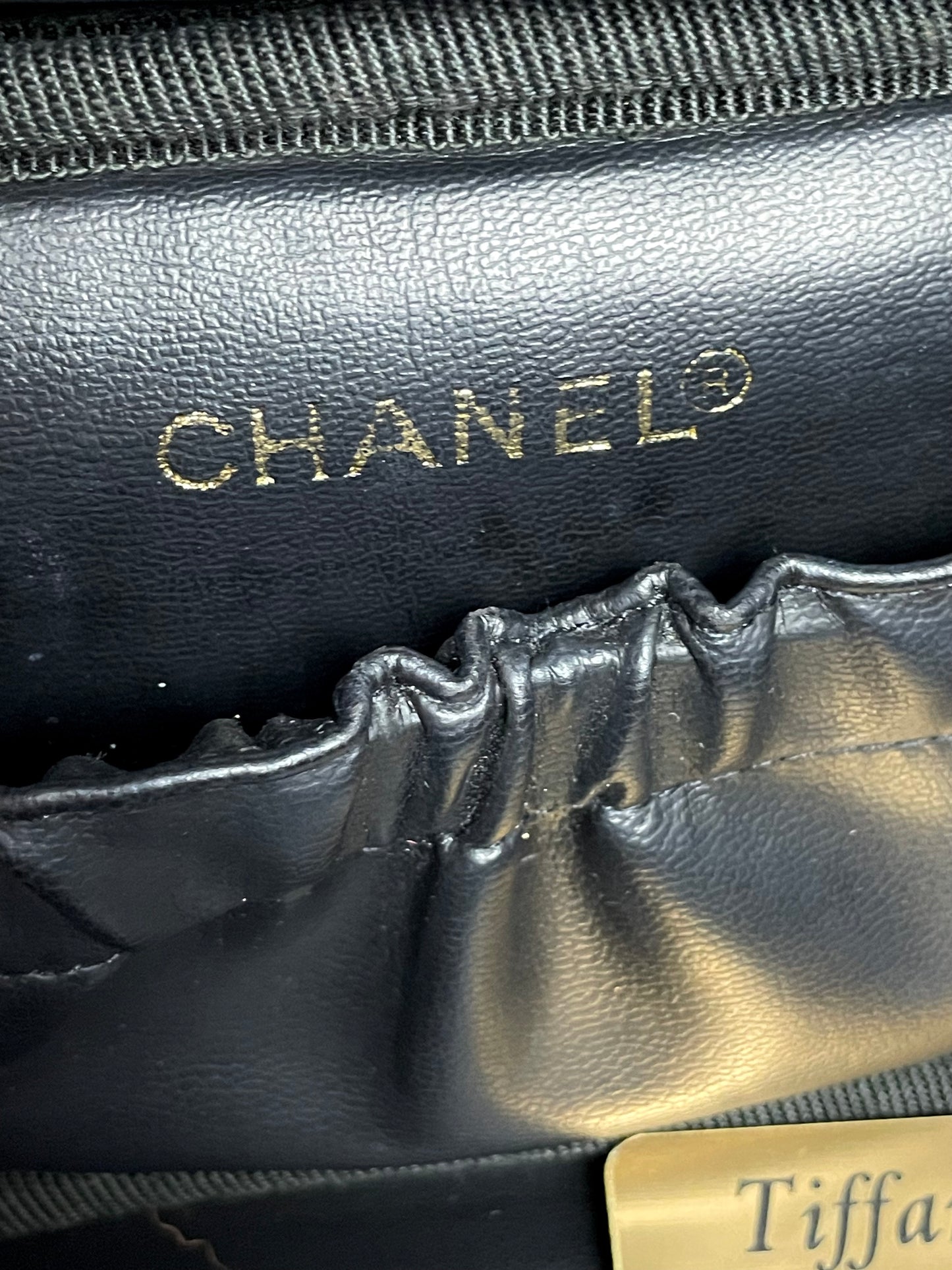Authentic CHANEL Vanity Cosmetic Case crafted of Black Patent Leather