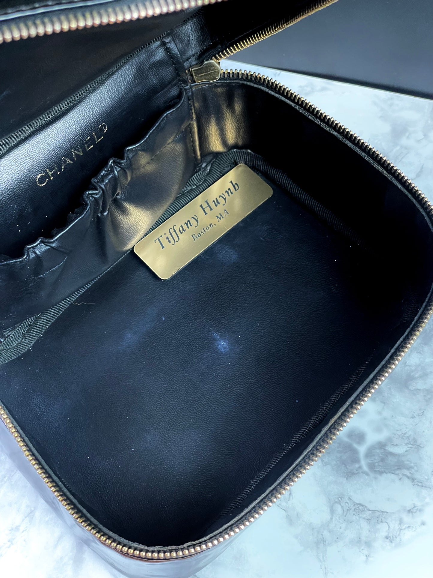 Authentic CHANEL Vanity Cosmetic Case crafted of Black Patent Leather