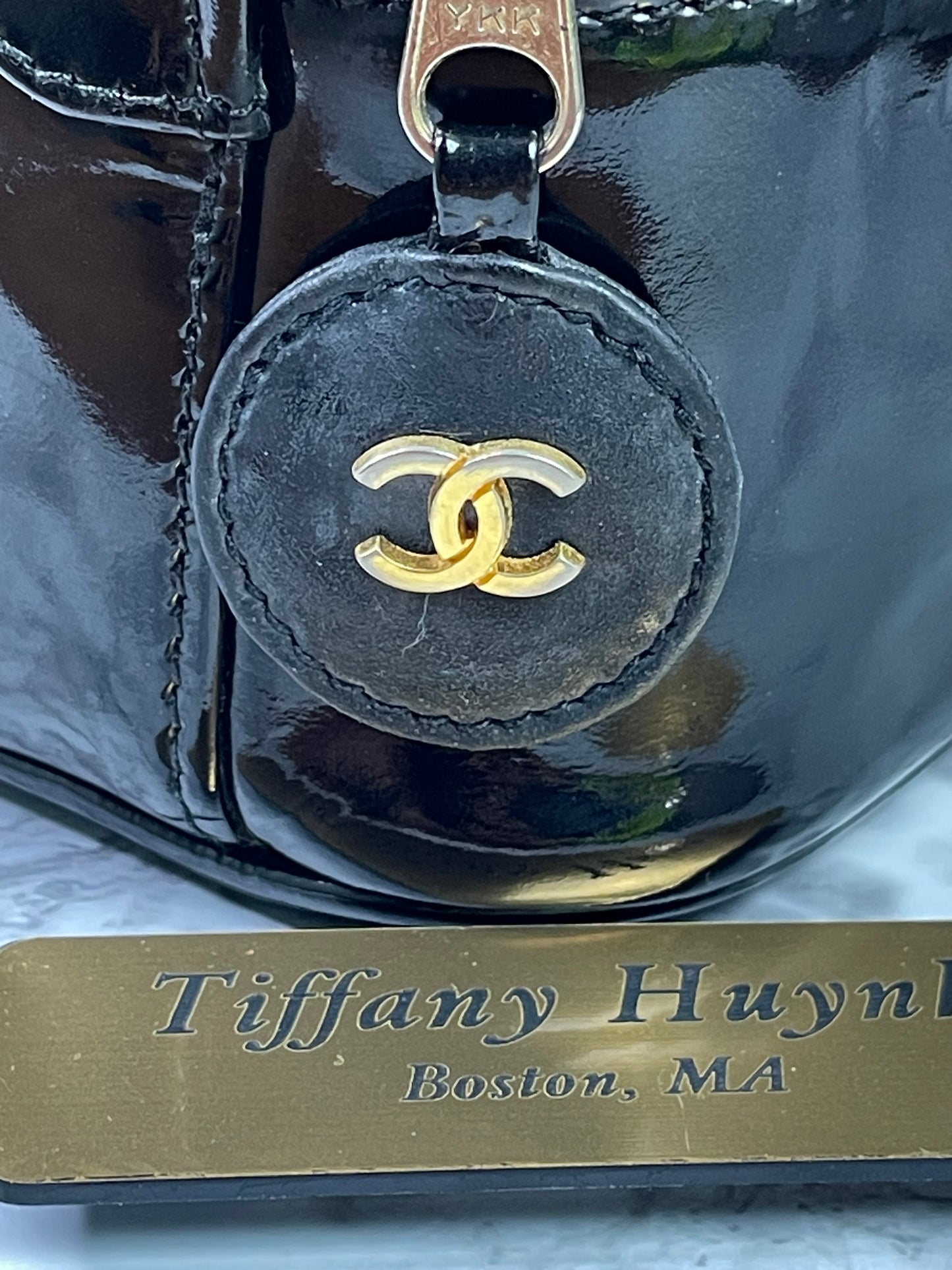 Authentic CHANEL Vanity Cosmetic Case crafted of Black Patent Leather