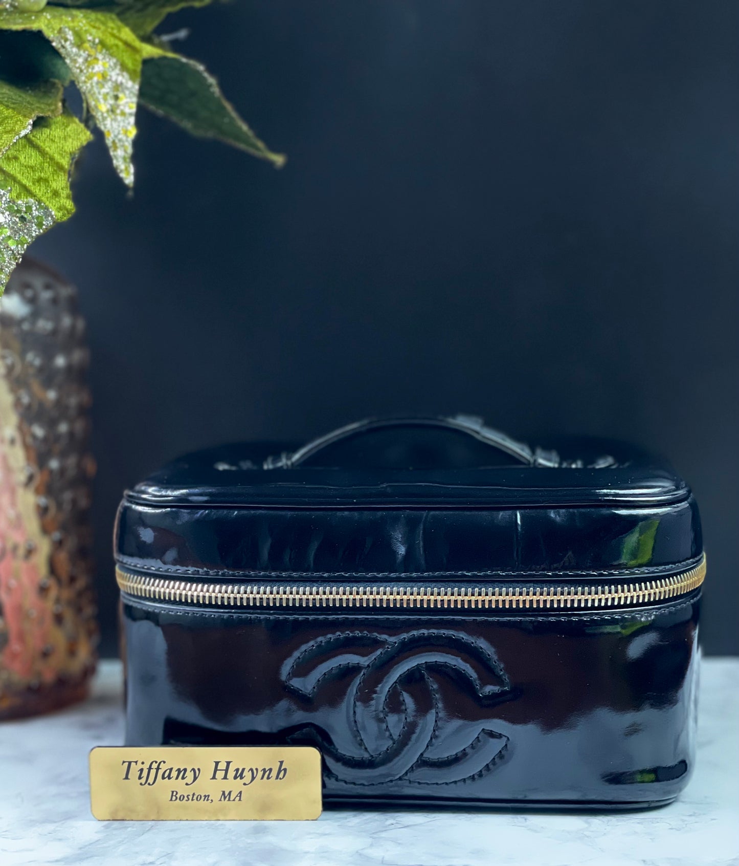 Authentic CHANEL Vanity Cosmetic Case crafted of Black Patent Leather
