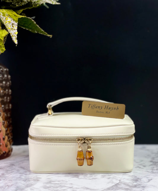 Authentic Vintage Gucci Bamboo Vanity bag in patent white leather